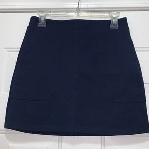 4/$10 Forever 21 navy size 26 (size 2-4) school uniform type skirt